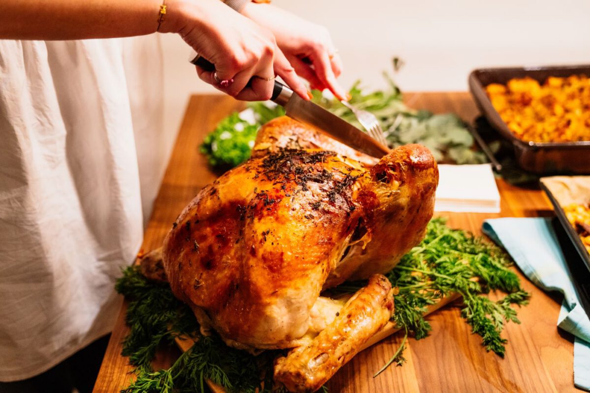 person-cutting-turkey